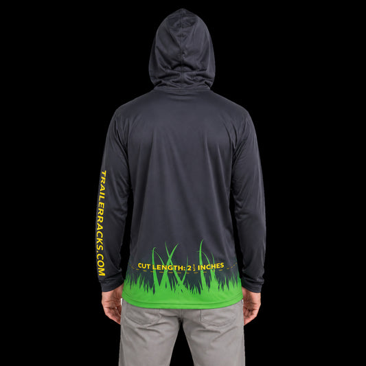 DS100 Crew Protection Skin Guard work shirt worn hood up, back view, showing the green grass hem graphic and cut length print